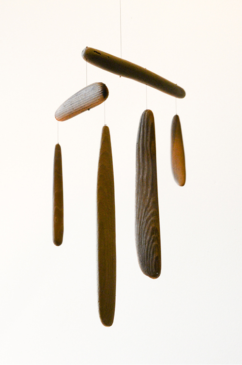 "Split Level" &emsp; Driftwood, string and clam shell bead &emsp; 10"x18" &emsp; 2009