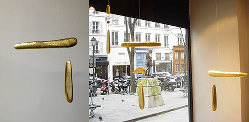 "Eve" &emsp; Driftwood, jesso, clay, pure gold leaf, string and 18k gold bead &emsp; 10"x12" &emsp; &emsp; "A Dialogue of Women in America" &emsp; Gold leaf mobiles &emsp; Paris &emsp; 2013